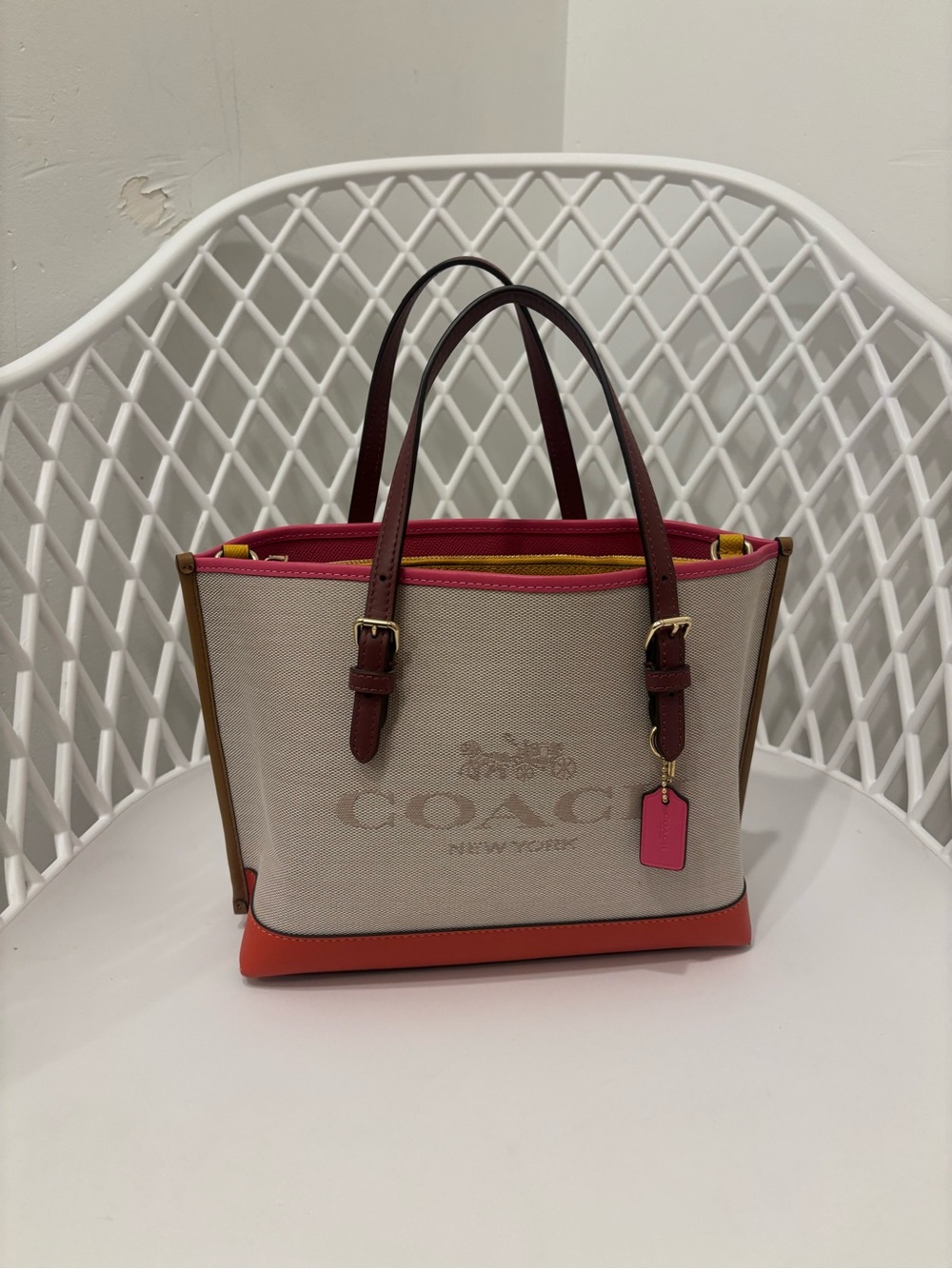 Coach Canvas Tote with Beige Body and Pink & Orange Accents